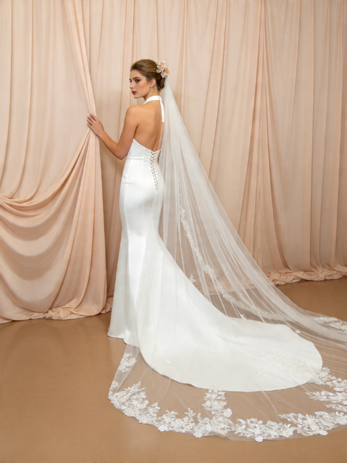 Bridal photoshoot with scattered floral lace cathedral veil, romantic wedding portrait