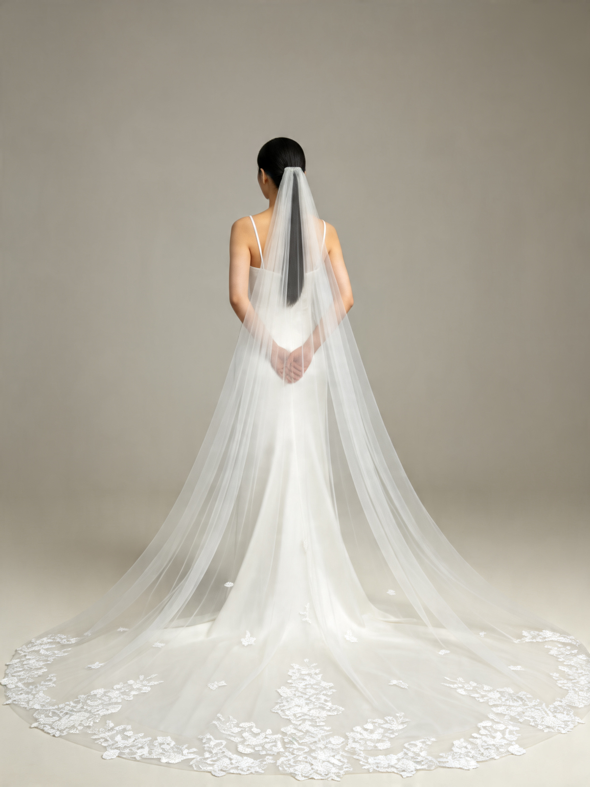  Back view of scattered floral lace cathedral veil, showing the full lace hem and scattered blooms