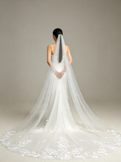  Back view of scattered floral lace cathedral veil, showing the full lace hem and scattered blooms