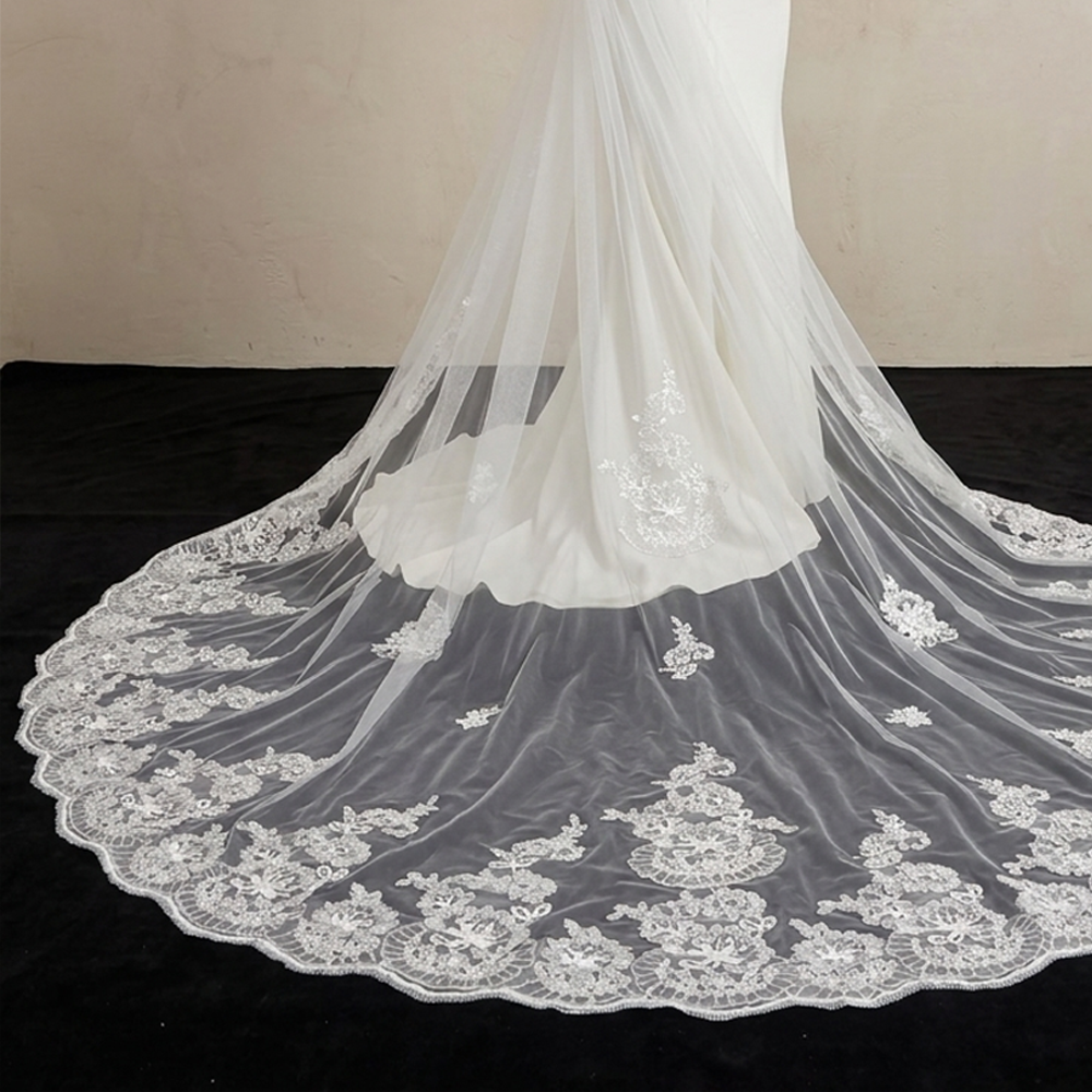 Close-up of vintage floral lace border on cathedral veil