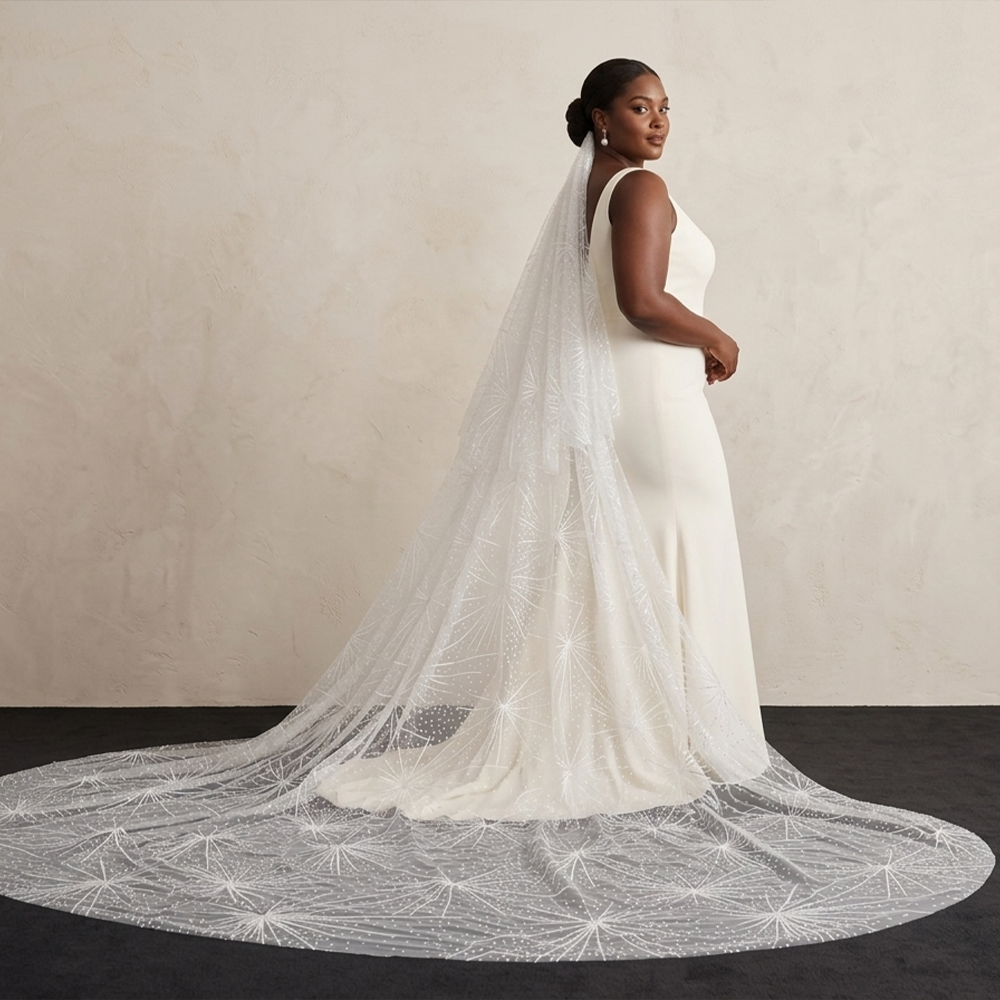 black bride wearing starburst firework glitter cathedral wedding veil