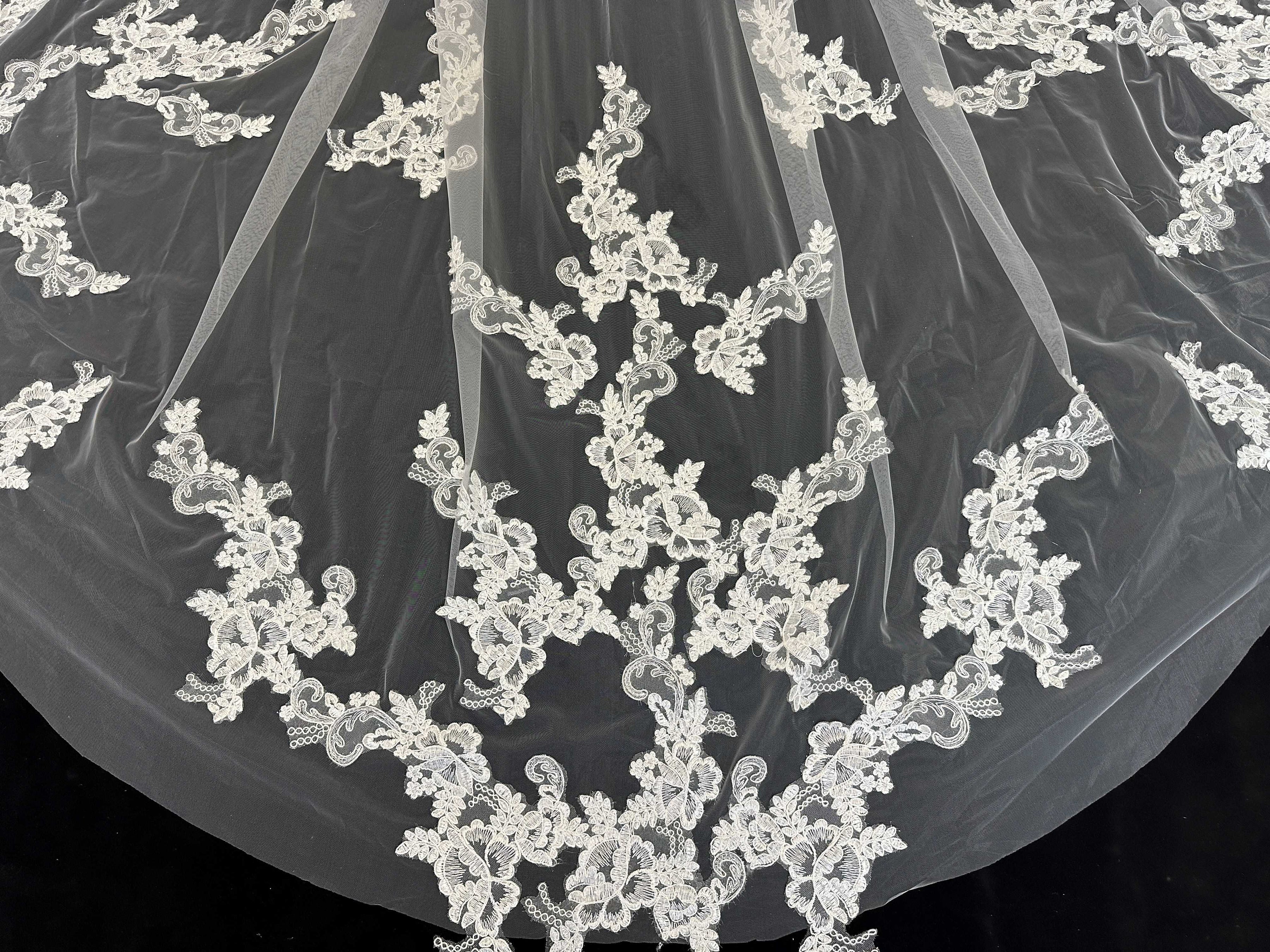 Close-up of intricate floral lace on Floral Canopy cathedral tulle veil, full circular embroidery detail