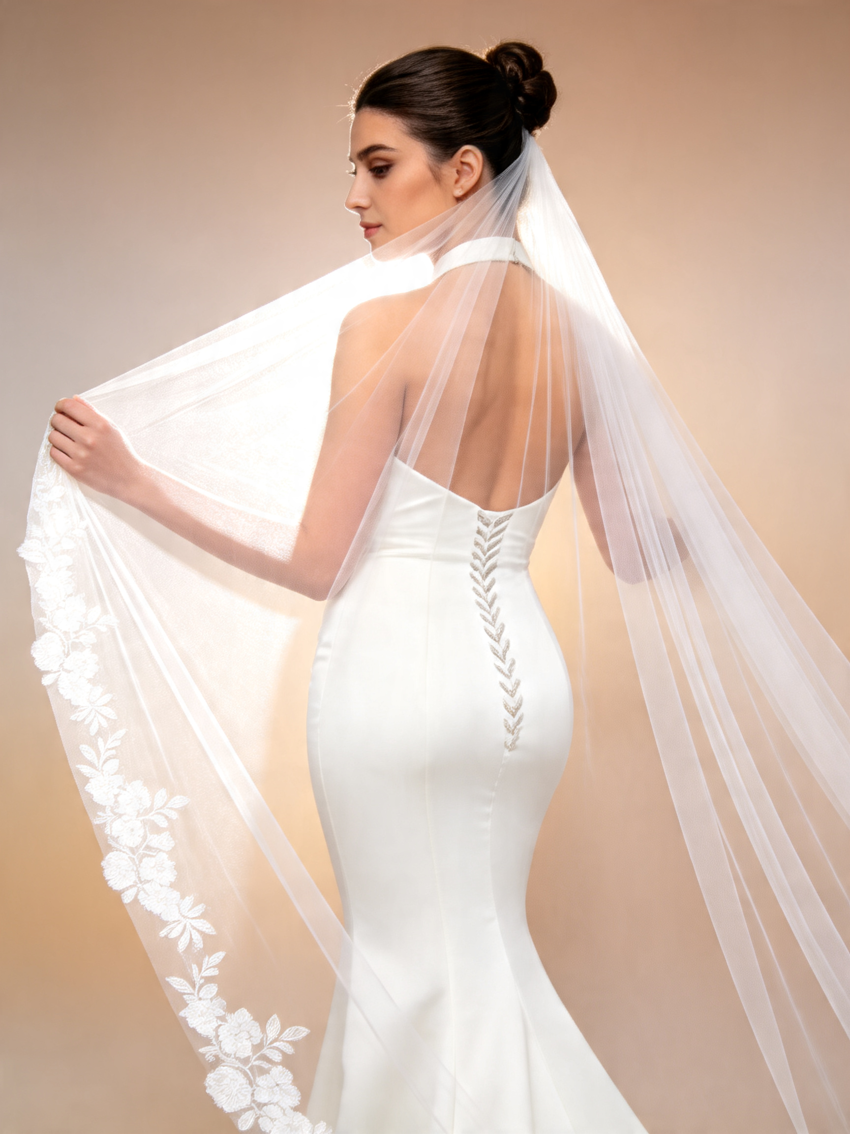 Lotus Circle cathedral tulle veil, side view of floral lace trim on bridal veil in studio portrait