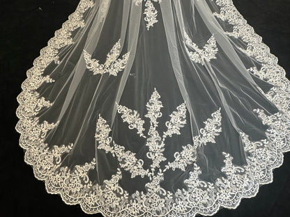Close-up of forest canopy lace cathedral veil, intricate tree-inspired embroidery detail